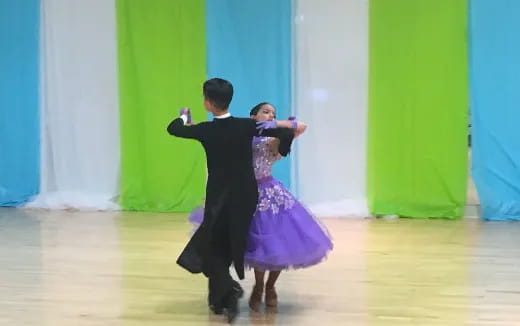 a man and woman dancing