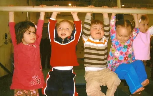 a group of children posing for a photo