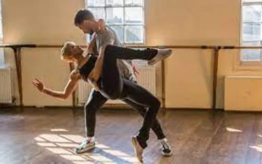 a man and a woman dancing