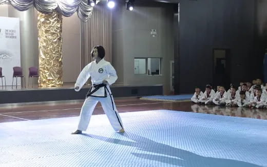 a person in a karate uniform
