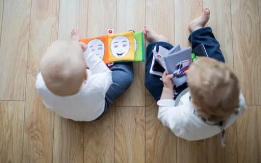 a group of children playing with a toy