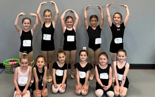 a group of girls posing for a photo