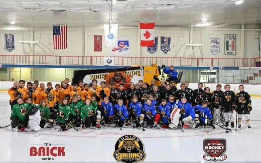 a group of people in hockey uniforms