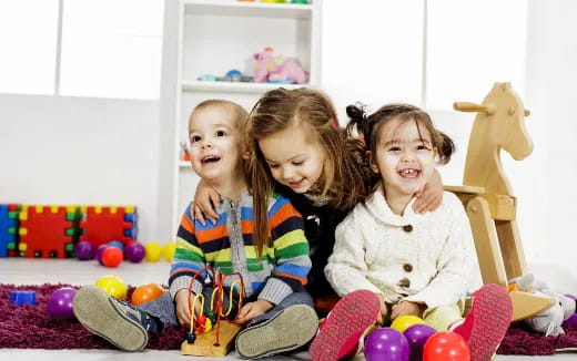 a group of children sitting on the floor