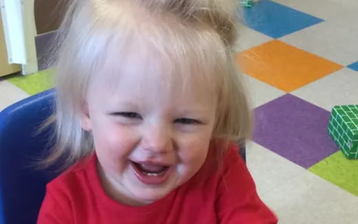 a child with a surprised expression