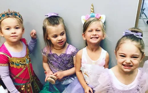 a group of children wearing clothing
