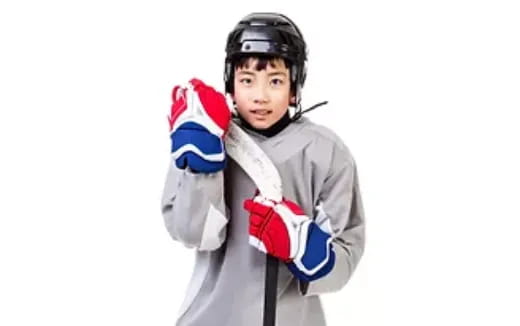 a person wearing a helmet and gloves