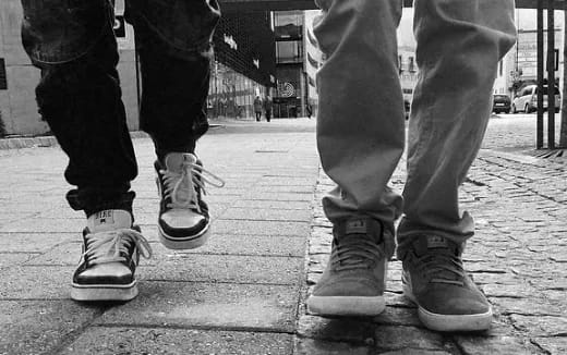 a pair of legs with shoes