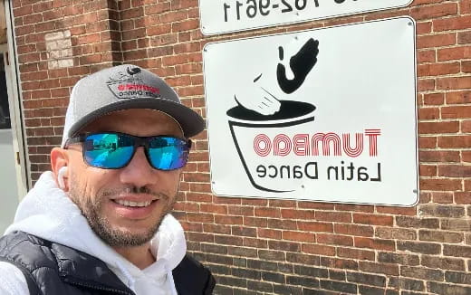 a man wearing sunglasses and a hat