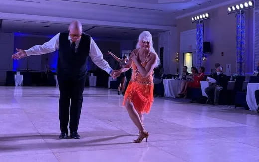 a man and woman dancing