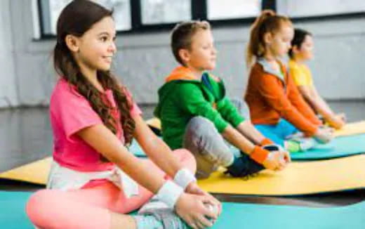 a group of children sitting on the floor