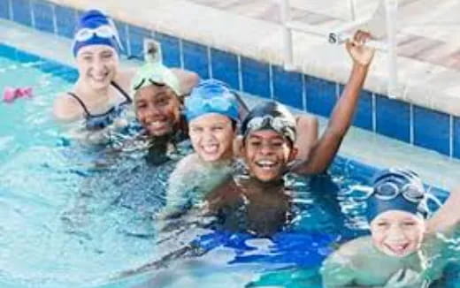 a group of people in a pool