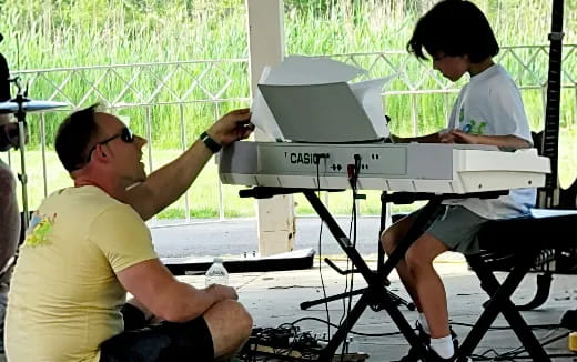 a couple of men playing music