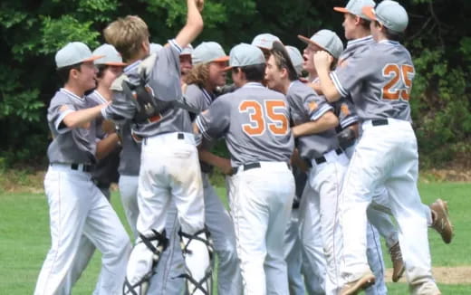 a group of baseball players celebrating