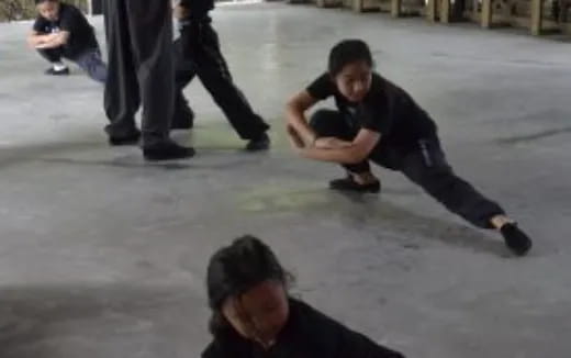a man kneeling on the ground