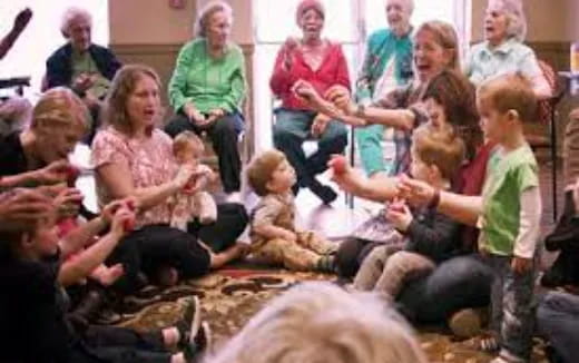 a group of people sitting in a circle