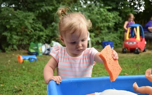 a child playing with a toy