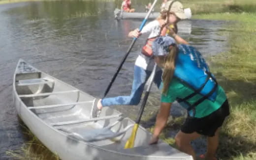 a couple of people in a boat