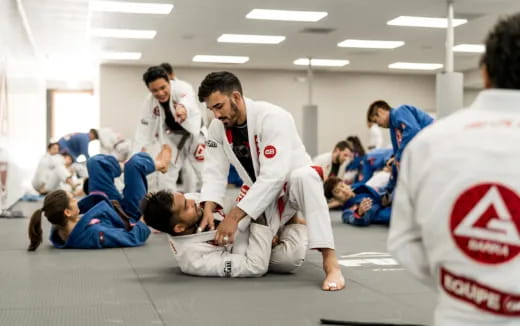 a group of people in karate uniforms