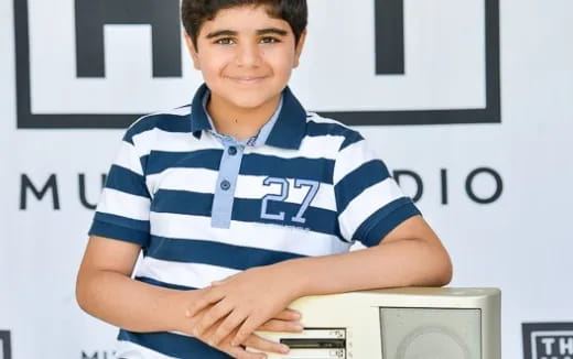 a person sitting at a computer