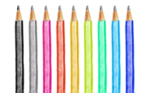 a group of colored pencils