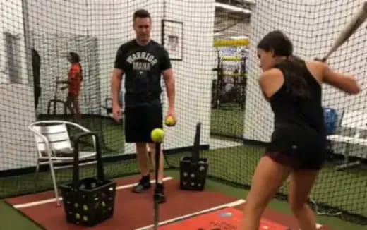 a person hitting a ball with a tennis racket