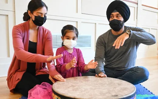 a group of people wearing masks
