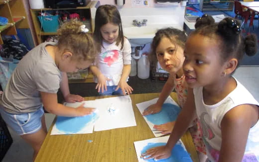 a group of children in a classroom