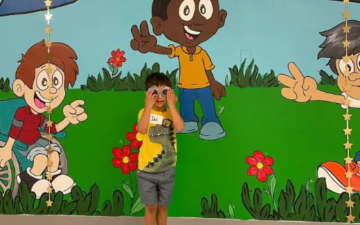 a group of kids holding flowers