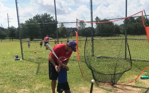 a couple of kids playing baseball