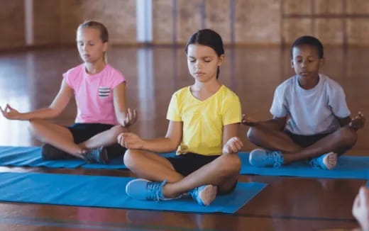 a group of young girls exercising