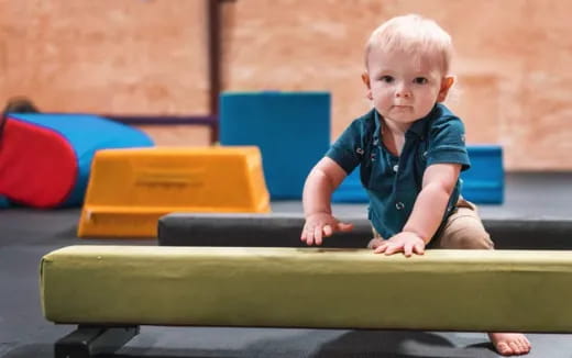 a child sitting on a bench