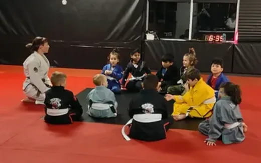 a group of children sitting on the floor