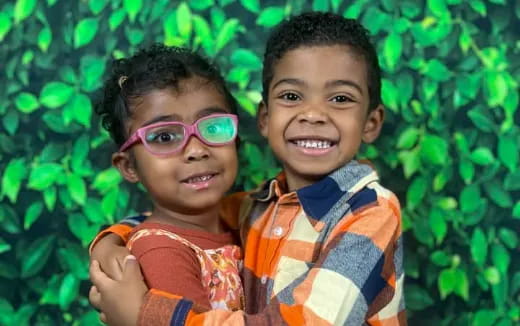 a couple of children wearing goggles