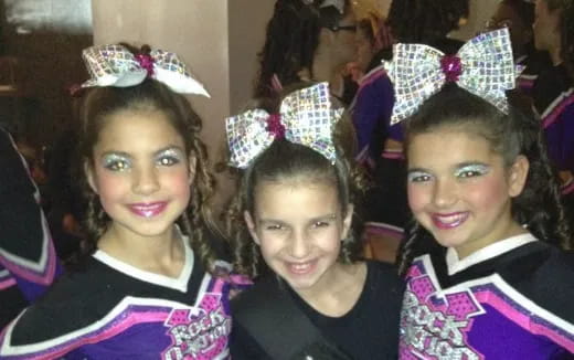 a group of girls wearing clothing
