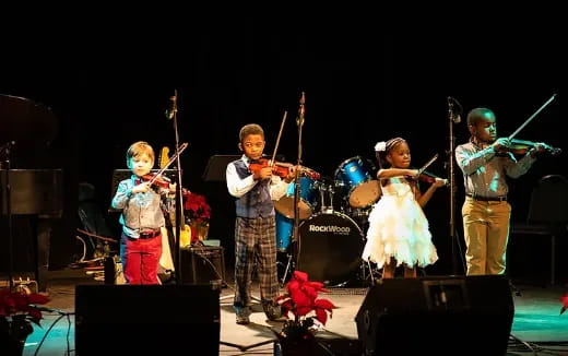 a group of people on a stage