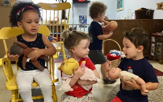 a group of children playing with toys
