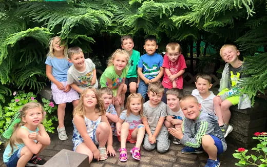 a group of children posing for a photo