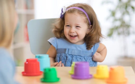 a child sitting at a table