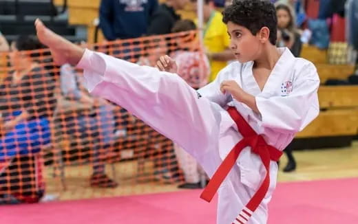 a person in a karate uniform