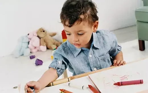 a child sitting at a table