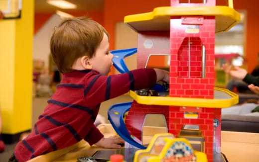 a child playing with a toy
