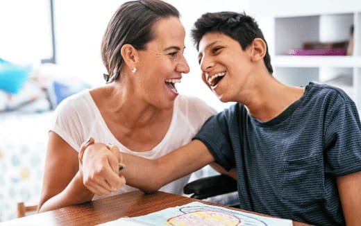 a man and a woman laughing