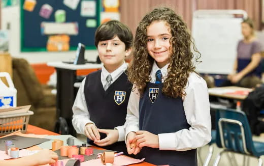 a person and a boy in a classroom