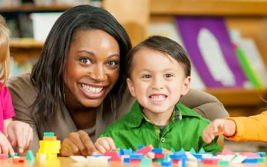 a person and a child smiling