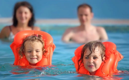 a group of people in a pool