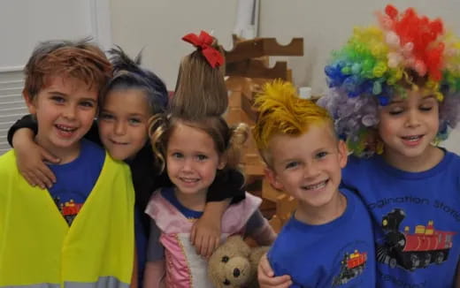 a group of children posing for a photo