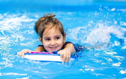 a girl in a pool