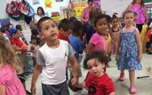 a group of children in a room