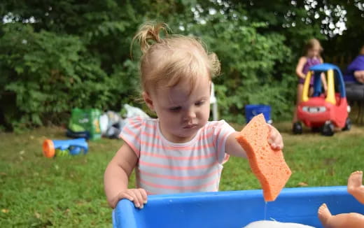 a child playing with a toy